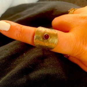 Spoon bent ring with red ruby stone